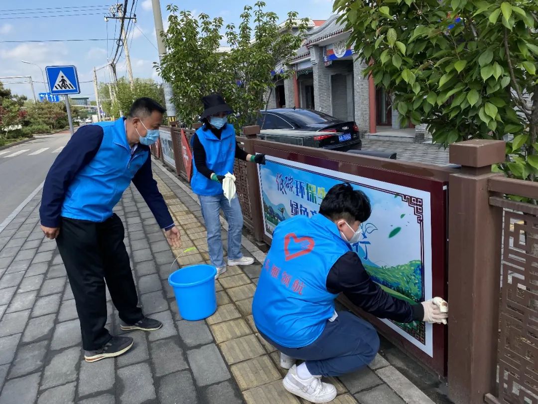 雁栖镇“五员上岗助创城”志愿服务活动.jpg